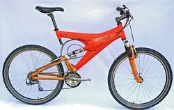 Trek Y-22 carbon fiber mountain bike, retro 1998 full suspension. Size Large, very orange carbon fiber body. Wheels and...