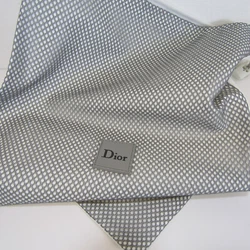 Striking grey and white shoe or dust bag by DIOR. A thick logo label is sewn onto the center of the bag. The bag is...