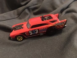 This Hot Wheels Jack Hammer red car toy vehicle is perfect for collectors and kids alike. With a 1:64 scale, it is made...