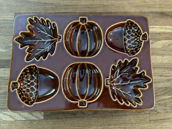 Up for sale is a new without tags Crate & Barrel FALL Cakelet BREAD Mold Brown Acorn Pumpkin Leaf Glazed Ceramic. Any...