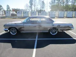 Here is a very solid 1962 Chevy Impala 2 door. It has a good running 235 straight 6 engine with an automatic powerglide...