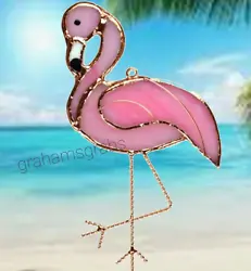 This is the Beautiful Stained Glass Pink Flamingo Suncatcher by Gift Essentials! The colorful Gift Essentials Flamingo...