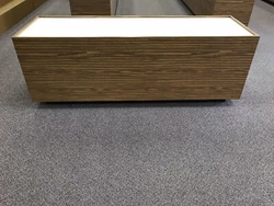 display table. 30” high27” wide84” longWalnut Formica covered sides with cream color top.Excellent condition