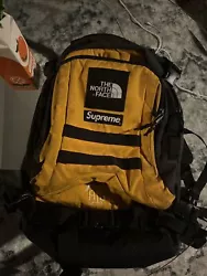 This yellow backpack from the Supreme x The North Face collaboration is a must-have for any fashion-conscious man. With...