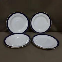 From Spode, these are 4 dessert or bread plates in the Consul pattern. They are white with a cobalt blue band and gold...