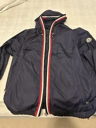 Moncler Windbreaker Striped Jacket - Size 4. Condition is Pre-owned. Shipped with USPS Priority Mail.