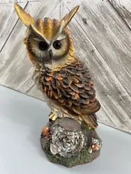 This stunning resin owl figurine stands at a height of 11 inches, making it a unique and eye-catching collectible for...