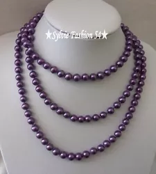 Collier sautoir fantaisie perles de verre nacrées lumineuses. Longueur du collier: 120 cm, perle 7 mm. Couleur :...