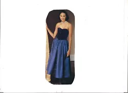 A beautiful saturated colored jewel blue party dress with deep v piped waistline for definition and femininity. It is...