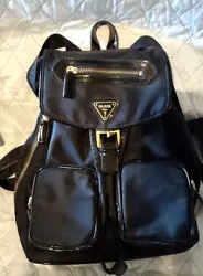 Guess Black Nylon Patent Faux Leather Backpack with wide durable adjustable straps. This backpack looks like a very...