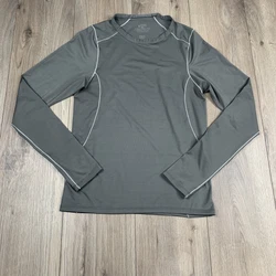 Patagonia Long sleeve Womens Size XS Xtra Small. There is a small hole on the left under arm and the collar has a flaw.