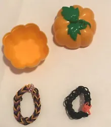 Festive Halloween Rainbow Loom Package. Includes cute pumpkin container, and 2 Halloween inspired bracelets.