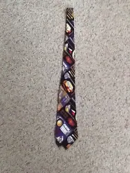 100% silk HAND MADE TOP FLITE GOLF TIE IN VERY GOOD CONDITION.
