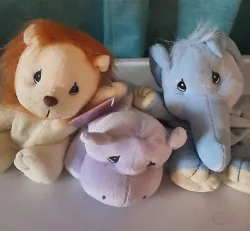 Lot of 3, as pictured. You will receive a purple hippo, a blue elephant, and a light yellow lion. Small Beanie Babies...