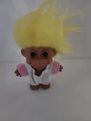 This 4-inch vintage Russ Troll doll with yellow hair is the perfect addition to your collection. The gender-neutral...