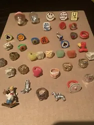Vintage Vending Machine Rings / Charms / Premiums 1970’s . 39 items total. Selling as is as found condition. Shipping...
