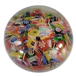 Circa 1920 to 1930. This is a nice example of a pre1930s scrambled millefiori paperweight from China filled with a nice...