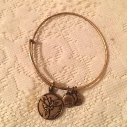 Similar to Alex and Ani bracelets. Just like Alex and Ani, these bracelets are not made from real silver and gold....