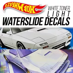 (These waterslide decals work over any color! 4) Transfer decal from blue decal paper onto car with soft brush or...