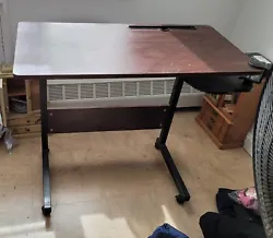 PRICED TO SELL!!!   Small computer desk with built in mouse pad on wheels.   Dimensions 31.5 L 15.5 W 27 H   $15 obo ...