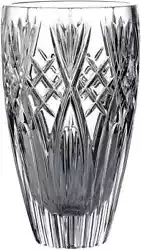 The Westbrooke vase features a distinctive cut pattern combining deep vertical cuts with a series of leaf-like shapes....