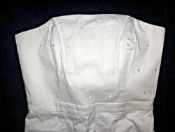 WHITE 100% POLISHED COTTON EMBROIDERED AND LACEY AT THE HEM. ANN TAYLOR DRESS SZ 6 STRAPLESS. INNER BONING AND ELASTIC...