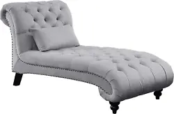 Light gray chaise lounge with lumbar pillow. The dramatic curves of the chaise give way to traditional accent in the...
