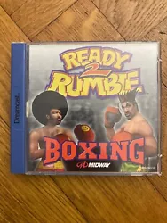 Ready 2 Rumble pour Sega Dreamcast : le boitier est en mauvais état, charnière cassée, fêlures, picots manquants....