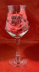 This wine goblet from Vanished Valley Brewing Co. boasts a beautiful design with flying birds and represents a piece of...