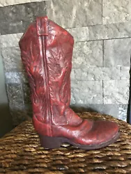 WESTERN RED COWBOY BOOT. HAS A WORN REALISTIC LOOK. USE ALONE OR WITH PLANT INSIDE ( FLORAL NOT INCLUDED). BOOT OPENING...