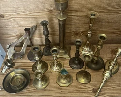 Huge lot of 12 brass candle sticks and 2 brass wall sconces. Sizes range from 3” to 11.5” tall. Have not tried to...