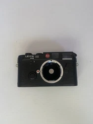Leica M6 0.72 black MINT condition, tested. Perfect condition. Tested. Does include screw on cap for camera body,...