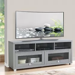 It includes two glass doors with storage space and three shelves for accessory storage. This TV stand can support a TV...