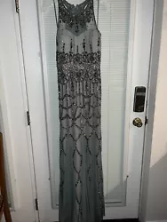 ADRIANNA PAPELL prom dress size 6. Full length, trumpet style. Grey with all over sequins. Worn only once, has been...