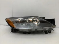 Up for sale is a good working part. It is a right passengers side HID headlight. This is a genuine authentic OEM MAZDA...