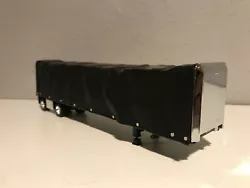 1/64th DCP new black Conestoga sliding tarp trailer.