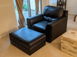 The set includes both the chair and the ottoman, chair weighing about 20-25 lb and ottoman about half that. The...