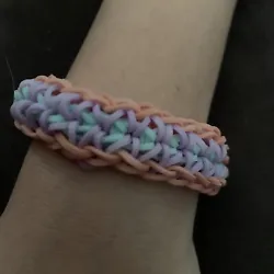 Get ready to add some color to your life with this Triple X Rainbow Loom Bracelet! Made by a talented 10-year-old, this...