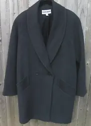 SHAWL COLLAR. THE FABRIC DOES NOT SEEM TO ATTRACT LINT AS OTHER BLACK FABRICS DO. SIMPLE ELEGANT COAT. PERFECT FOR ANY...