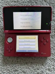 Nintendo 3DS Console - Metallic Red, and game lot. Based on what I’ve seen online, this appears to be the Metallic...