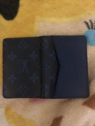 Authentic Louis Vuitton Monogram Multiple Wallet - M30299 - Navy Blue - Bi-Fold. Condition is Pre-owned. Shipped with...