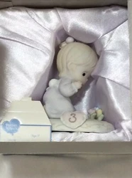 Precious Moments Age 3. Condition is New. Shipped with USPS Priority Mail. (G/E1)