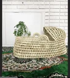 This listing is for a large woven palm leaf Moses basket bed with a hood and handles. No damage. Lightly used. No bed...