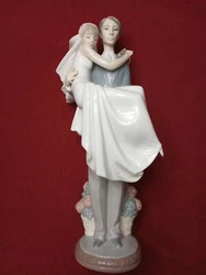 LLadro bride and groom figurine, no damage, like new, sorry no box. will accept returns. will ship insured.