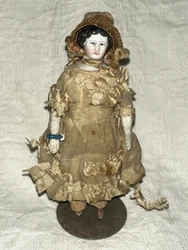 Antique Early All Original German China Head Dollhouse Doll. Offering this beautiful antique German dollhouse miniature...