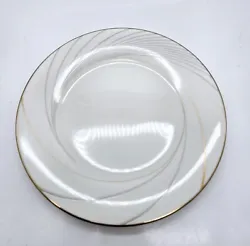 Noritake Golden Tide Dinner Plate Set 7739 Gold and Silver Design.  Like new, no flaws. I have 5 of these plates, all...