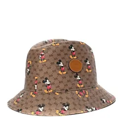 This sporty yet stylish cap is crafted of brown Gucci GG monogram canvas with an allover Mickey Mouse print. Clothing :...