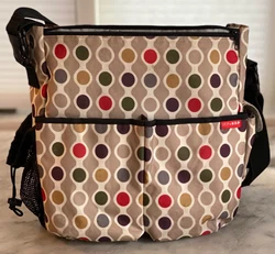 Skip Hop Diaper Bag - clean! Changing pad too! Refer to pictures. The bag is nice with lots of life left. No smell or...
