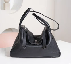 None of that stands out at all.This is a stunning bag! I am one of. always get them authenticated ! Its simple and...