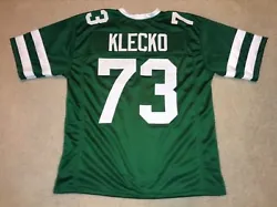 You are buying a Unsigned Custom Made Joe Klecko Green Jersey. ALSO.order 100.00 bucks or more of any unsigned jerseys...